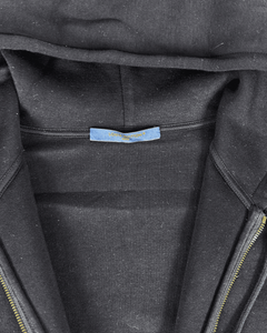 Blue Louis Vuitton logo label inside zip-up hoodie