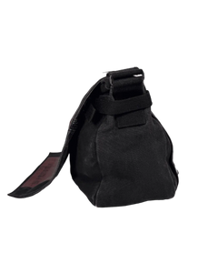 Black messenger bag with adjustable strap and flap front pocket