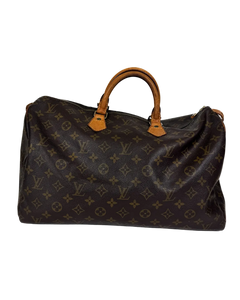 Louis Vuitton monogram duffle bag with tan leather handles and front zipper