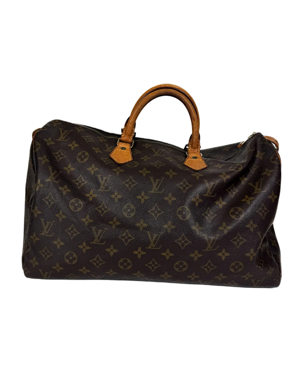 Louis Vuitton monogram duffle bag with tan leather handles and front zipper