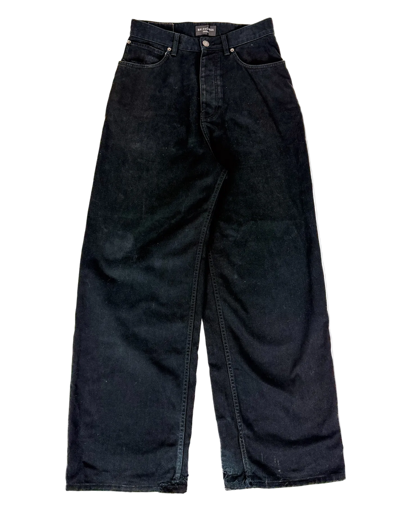 Oversized black jeans with straight wide legs and button fly.