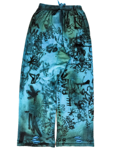 Balenciaga Skater loose sweatpants, blue-teal allover print and elastic waistband