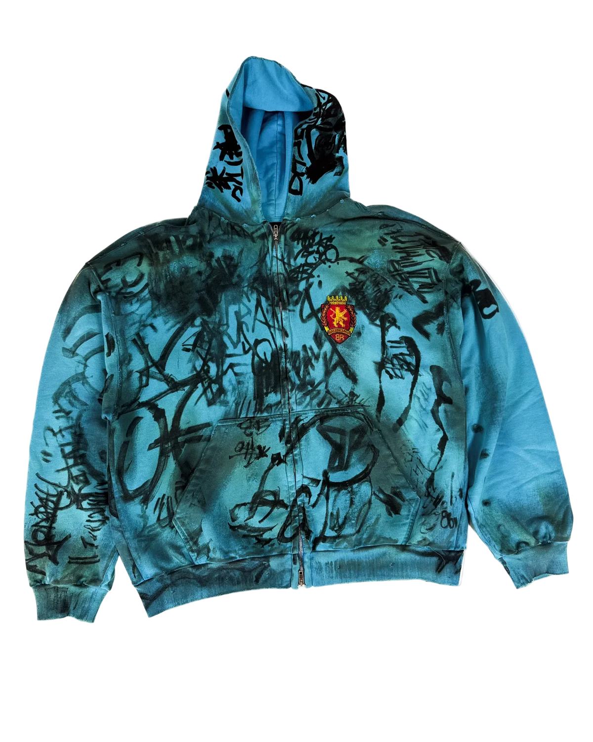 Blue zip-up hoodie with graphic scribble print and crest patch, pullover hood