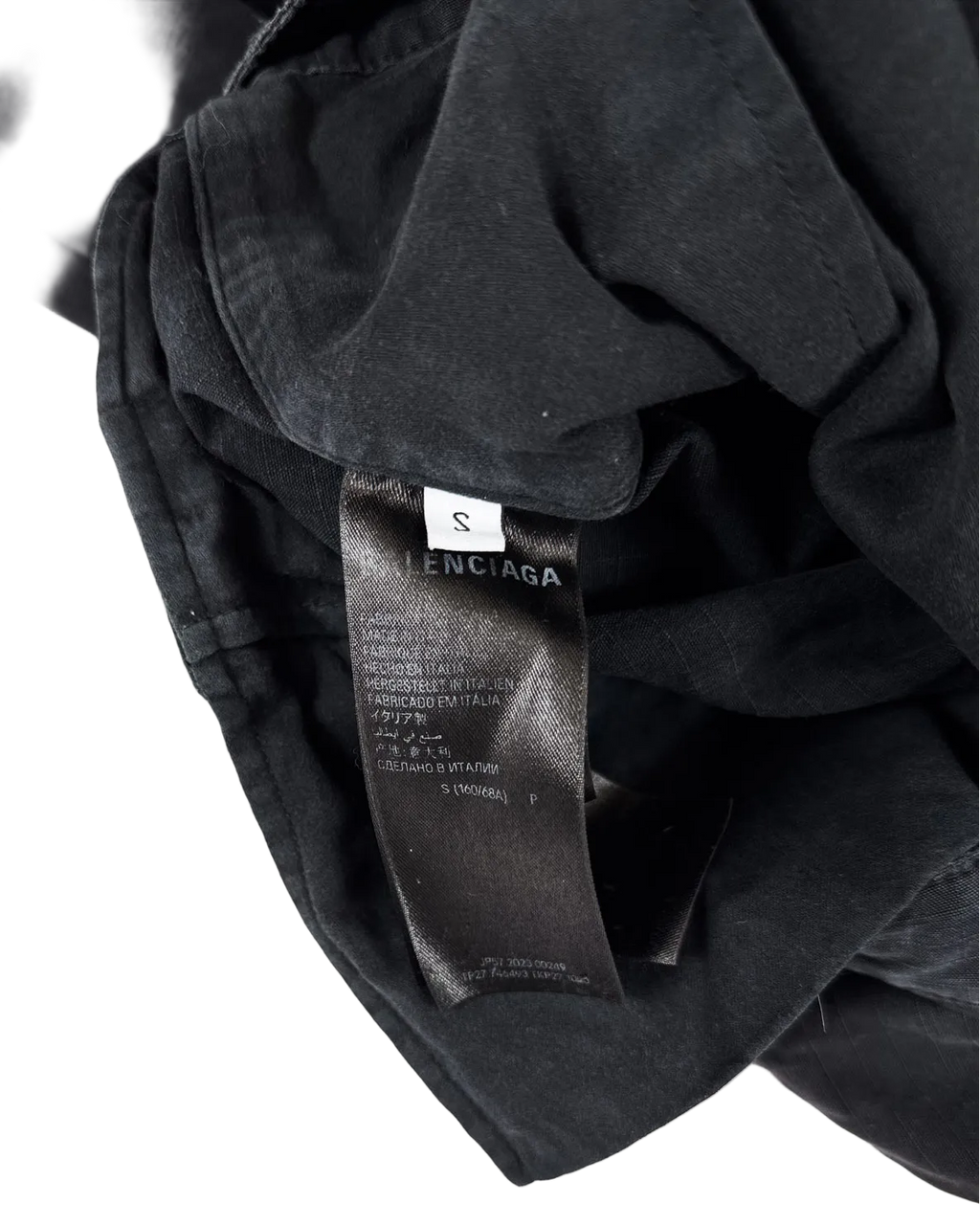 Balenciaga distressed cargo pants: dark gray waistband label, inner size tag