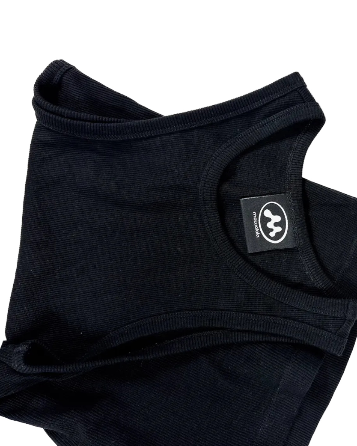 Black sleeveless tank with crew neck and circular emblem patch at shoulder