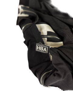 Black t-shirt with HBA logo patch and front zipper detail.