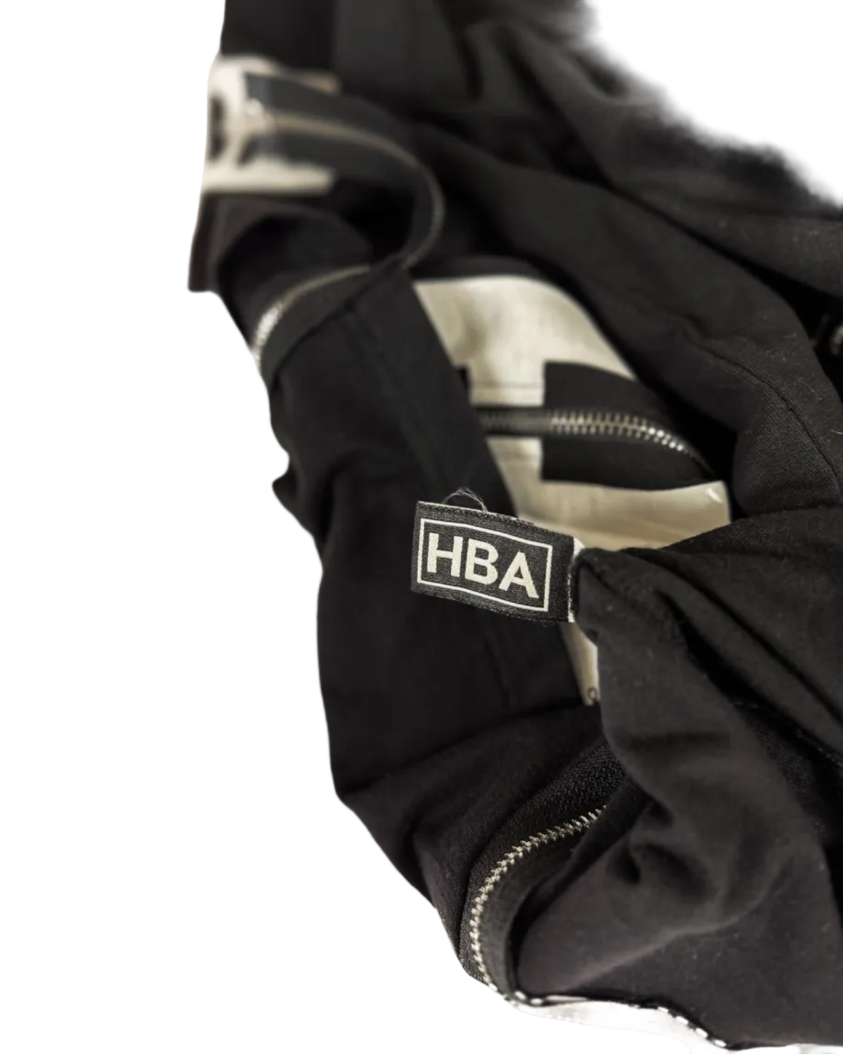 Black t-shirt with HBA logo patch and front zipper detail.