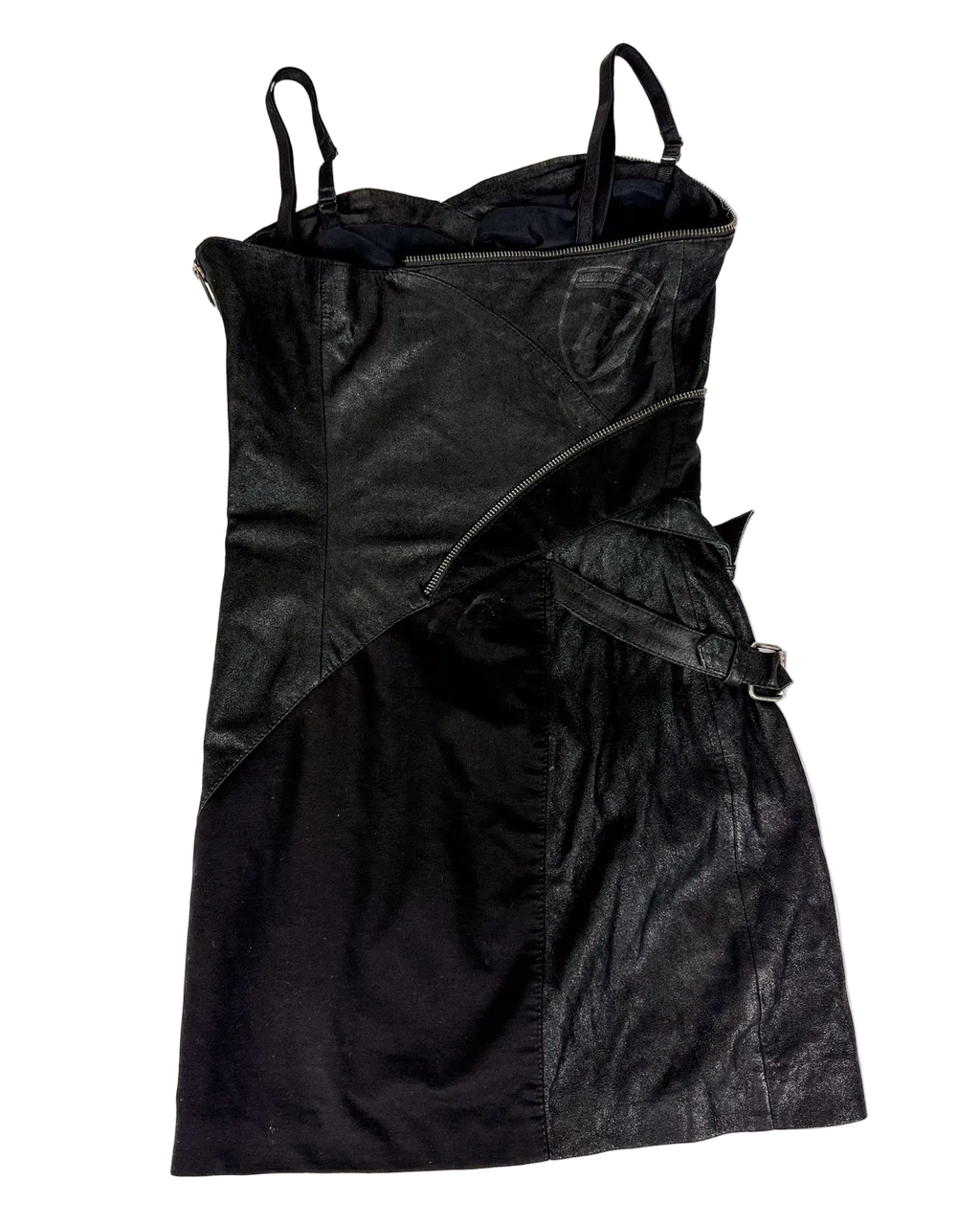 Dark patchwork zip-front dress with spaghetti straps and layered panel design.