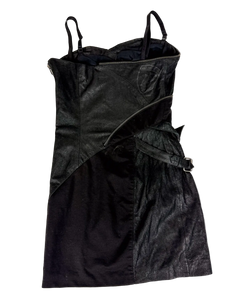 Dark patchwork zip-front dress with spaghetti straps and layered panel design.